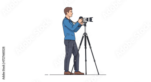Man holding a professional camera on a tripod ready to shoot.
