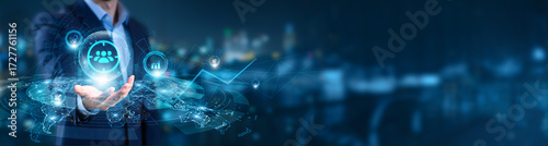 Businessman hand hold of Business Targeting and global networking. precision marketing platforms, customer segmentation, lead conversion analytics, AI-driven sales funnels