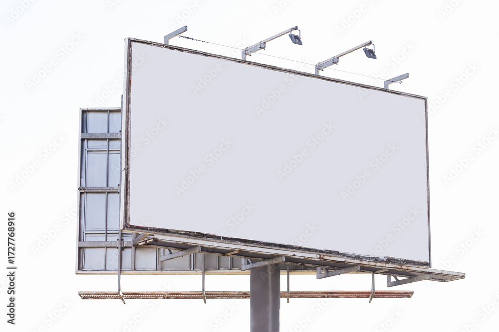 Obraz premium Blank billboard on white sky background. Large outdoor advertising space for commercial promotion and marketing. Empty signboard template for information banner or public business campaign.