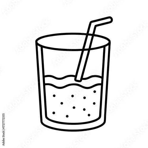 Beverage in glass with straw and bubbles  