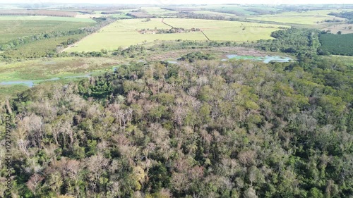 Drone view of rural farmland with native vegetation and preservation areas in São Paulo countryside, Brazil
