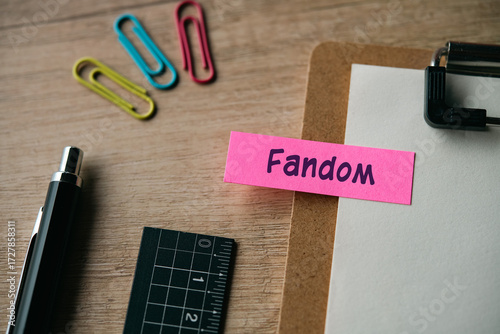 Obraz na płótnie There is a piece of paper with the word Fandom