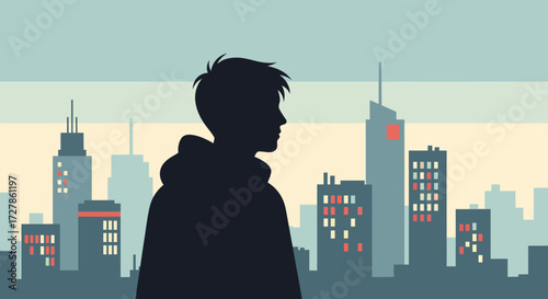 Silhouette of a person in a hoodie against a city skyline at dusk