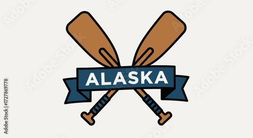 A stylized emblem featuring crossed oars and a banner displaying the state name Alaska.