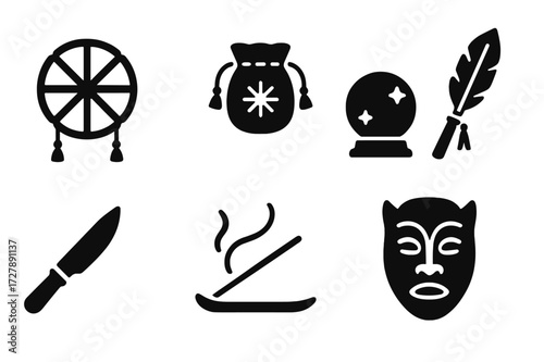 Shamanic Icon Set. Solid, filled icon set of shamanic objects: sacred drum, medicine bag, crystal ball, feather wand, ritual knife, incense holder, talisman,