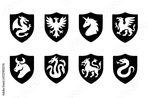 Mythical Creature Icons. Solid, filled icon set of mythological crests: dragon, phoenix, unicorn, griffin, minotaur, hydra, chimera, basilisk. Solid, filled