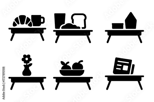 Breakfast Icons Grid. Solid, filled icon set of breakfast-in-bed trays: croissant and coffee, juice and toast, scrambled eggs plate, folded napkin, small