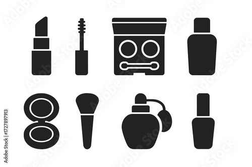 Black Makeup Icon Set. Solid, filled icon set of red carpet makeup: lipstick, mascara, eyeshadow palette, foundation bottle, blush compact, makeup brush,