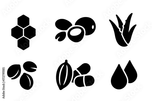 Natural Source Icons. Solid, filled icon set of pocket balm natural sources: beeswax comb, shea nuts, coconut, aloe leaf, jojoba seeds, cocoa pods, vitamin