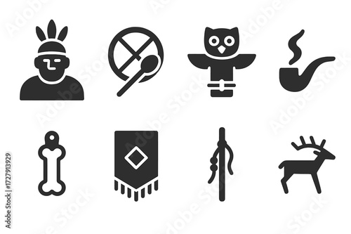 Shaman Icons Collection. Solid, filled icon set of shaman elder: feather headdress, ceremonial drum, spirit totem, smoke pipe, bone charm, ritual cloth, staff