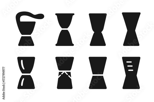 Jigger Icons Set. Solid, filled icon set of jigger design features: ergonomic handle, pouring spout, smooth edges, flat base, tapered sides, polished finish,