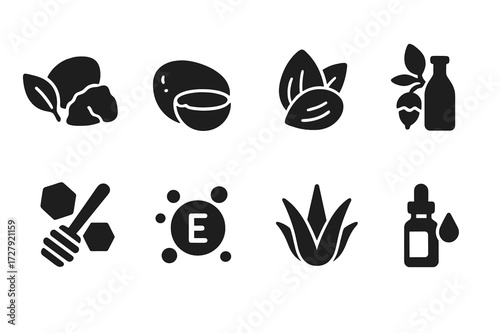 Cocoa Butter Icon Set. Solid, filled icon set of cocoa butter related natural ingredients: shea butter, coconut oil, almond oil, jojoba oil, honey, vitamin E,
