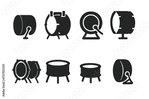 Bass Drum Icons. Solid, filled icon set of bass drum types: standard bass drum, marching bass drum, electronic bass drum pad, concert bass drum, double bass