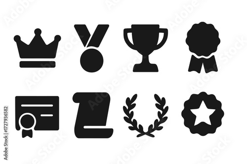 Award Symbols Collection. Solid, filled icon set of title symbols: crown, medal, trophy, ribbon, certificate, scroll, laurel wreath, star badge. Solid, filled
