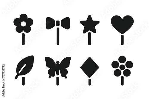 Black Hairpin Icons. Solid, filled icon set of hairpin decorative elements: flower, bow, star, heart, leaf, butterfly, geometric shapes, pearl cluster. Solid,