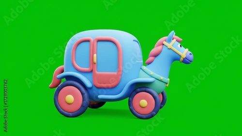 A blue toy horse-drawn carriage with pink accents is isolated against a vibrant green background.