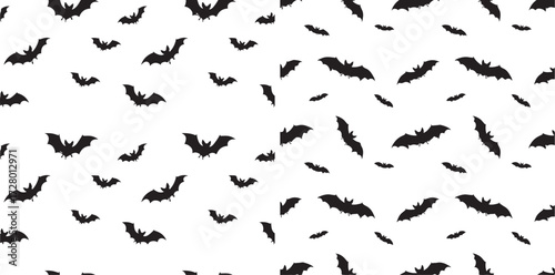 Seamless Pattern of Flying Black Bat Silhouettes on White Background