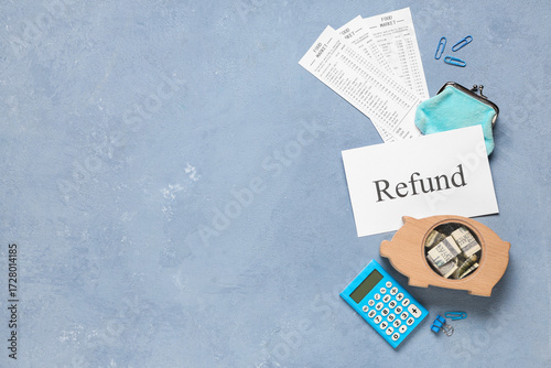 Paper with word REFUND, wal...