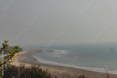 View of the unspoiled coastal stretch of Cox's Bazar beach, offering stunning natural beauty, Bangladesh.
