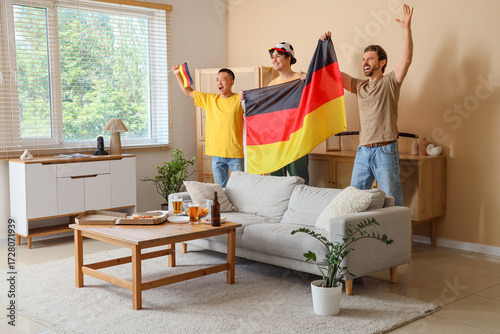 Male sports fans with flags...