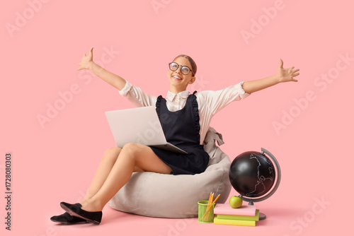 Female student with laptop ...