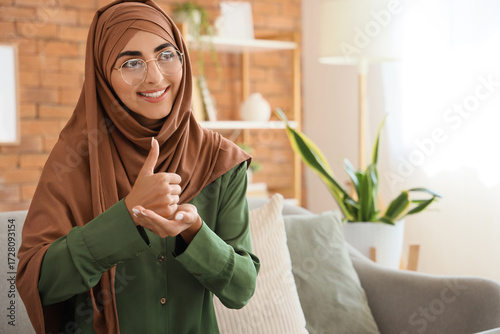 Young Muslim deaf mute woma...