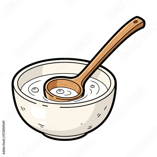 Bowl filled with clear liquid and wooden ladle