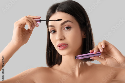 Beautiful young woman with ...