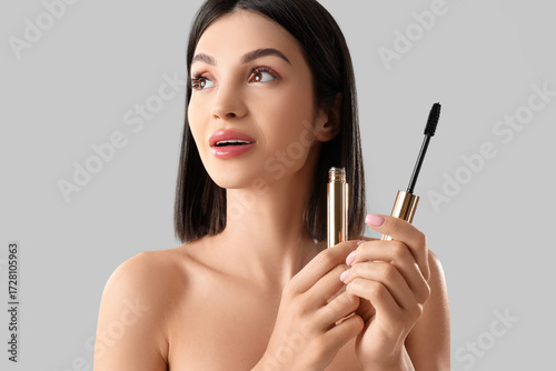 Beautiful young woman with ...
