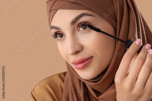 Beautiful Muslim woman appl...
