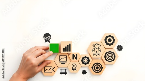 Flat lay honeycomb wooden blocks with business strategy icons and hand placing green lightbulb