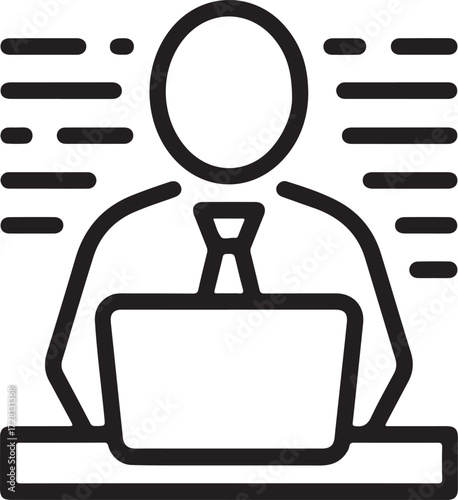 Business professional working on a laptop at a desk with blinds