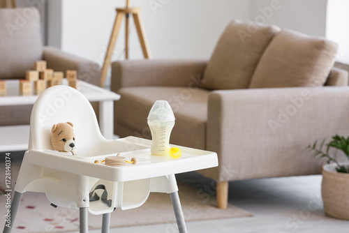 Baby highchair with bottle ...