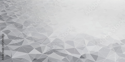 Grunge texture of a wrinkled, gray, and old crumpled paper sheet with a rough surface pattern