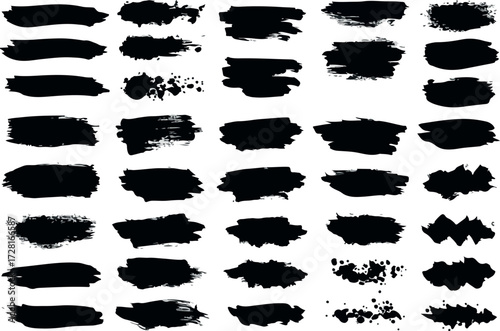 Collection of various black brush strokes and paint textures on white background.