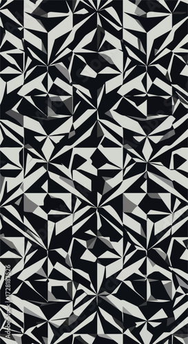 Geometric black and white pattern with sharp angles and complex shapes.