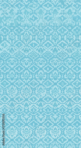 Intricate blue pattern design with repeating floral and geometric elements.