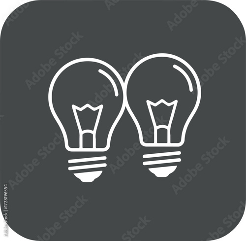 Two light bulbs representing ideas and innovation in a creative concept.