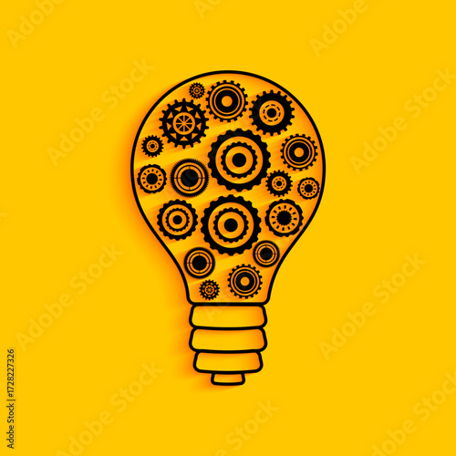 modern light bulb with cog and gear wheel concept background