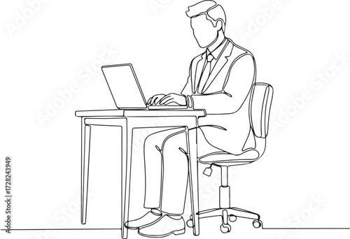 man sitting on a chair with laptop