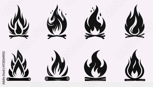 Eight black silhouette campfire icons with flames and logs, showcasing various designs for outdoor activities.