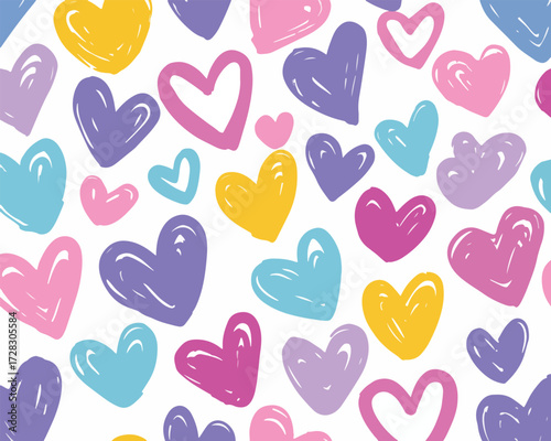 カラフルな手描きのハートが散りばめられた、愛と喜びを表現するシームレスなベクターパターン。