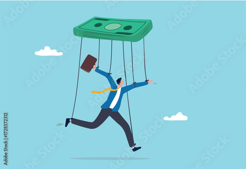 Being controlled by money, capitalism, greedy working environment, slavery, decision manipulation or bribery and corruption concept, pathetic slave businessman puppet doll being controlled by money