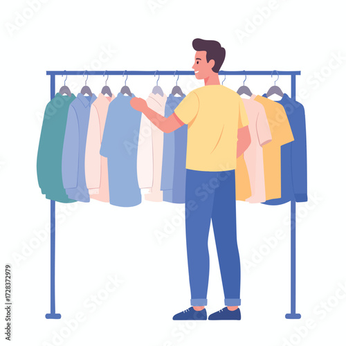 A man selecting clothing from a rack, choosing between shirts and tops.