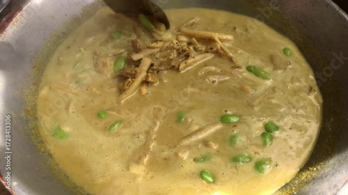 Coconut milk curry with pork and guinea pigs, Thai style curry
