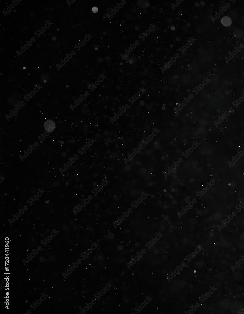 Obraz premium Abstract black background with floating particles
