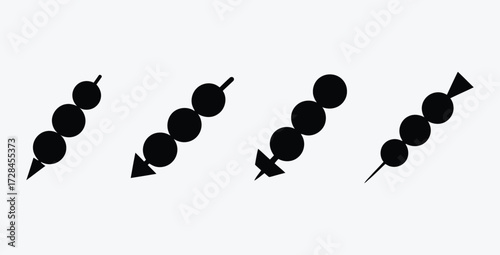 Four skewers with different tips in black and white isolated background