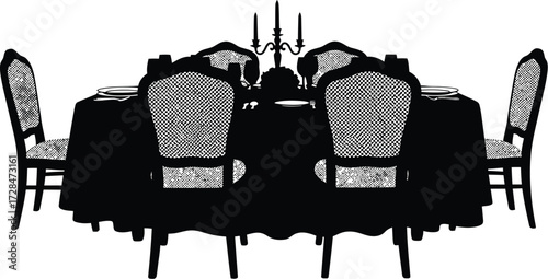 Formal dining table with candelabra, chairs, and tableware