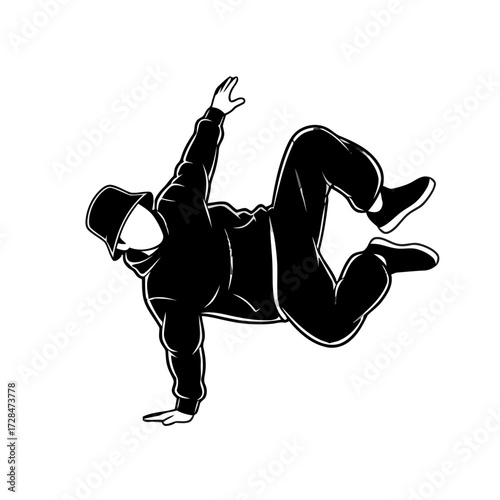 Silhouette breakdancer performing dynamic move