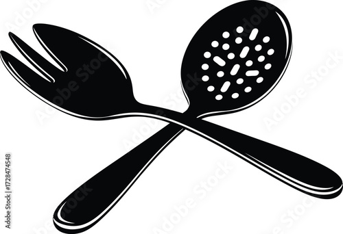Crossed salad fork and slotted spoon, cooking and serving utensils